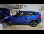 2023 BMW X1 in the garage.jpg